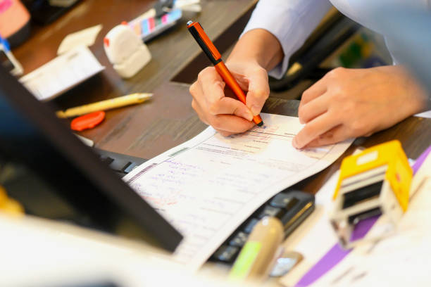 hospital nurse writing document